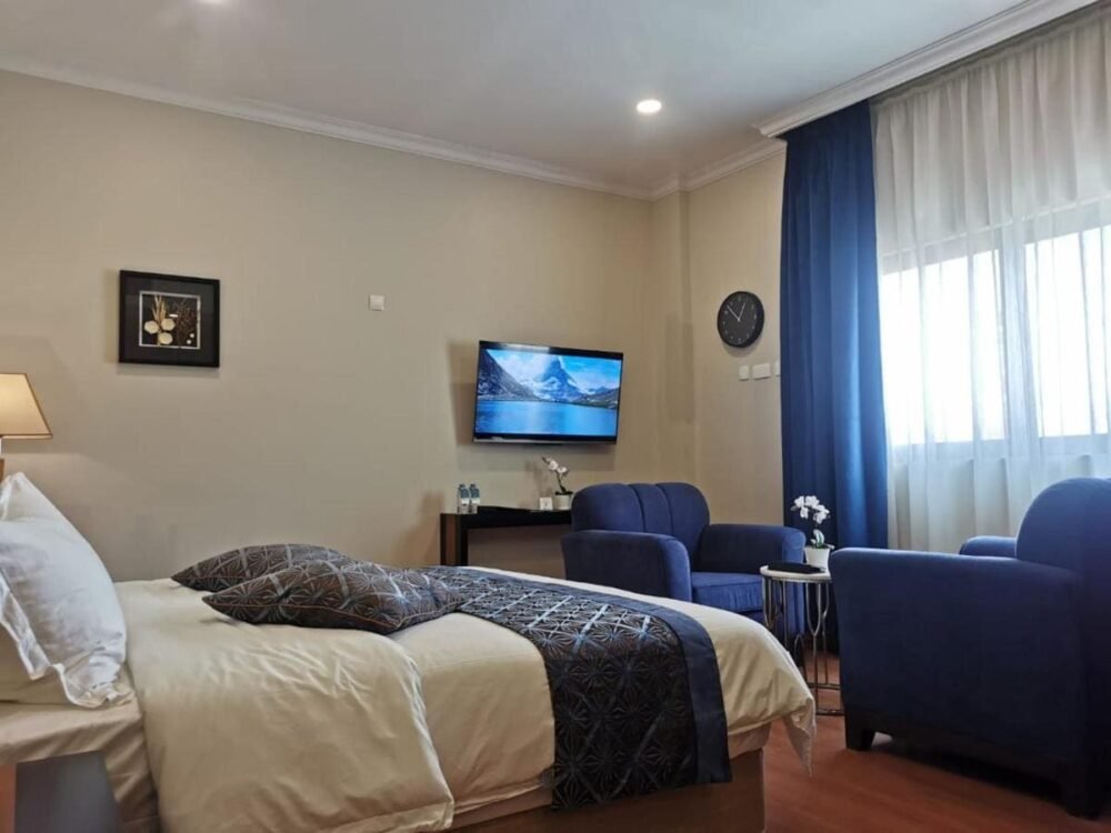 غرفة فندق Tripper Inn Hotel