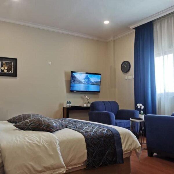 غرفة فندق Tripper Inn Hotel