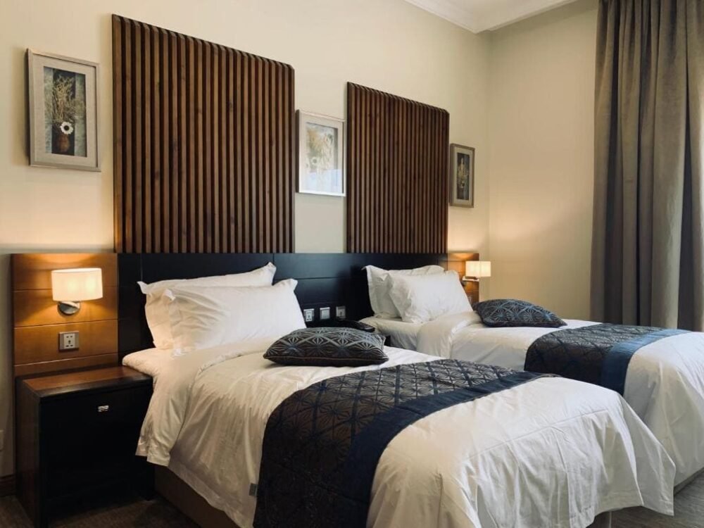 غرفة فندق Tripper Inn Hotel