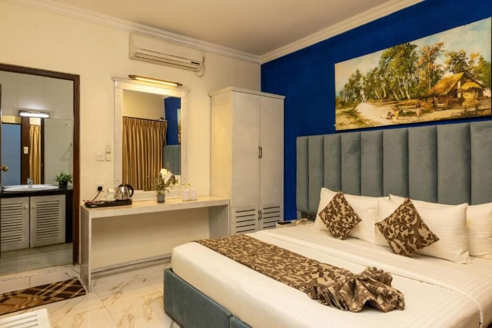 غرفة فندق كافيه أروما إن Cafe Aroma Inn